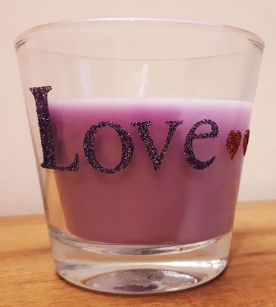 Love candle jar decorated with Sticky Roll and Glitter, the word love and some hearts